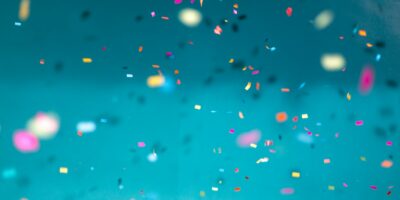 selective focus photography of multicolored confetti lot